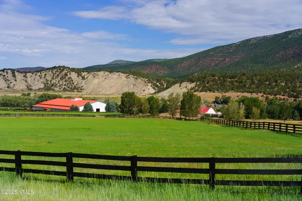 a view of a garden with houses