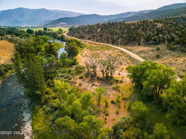 a view of a lake with mountains in the background