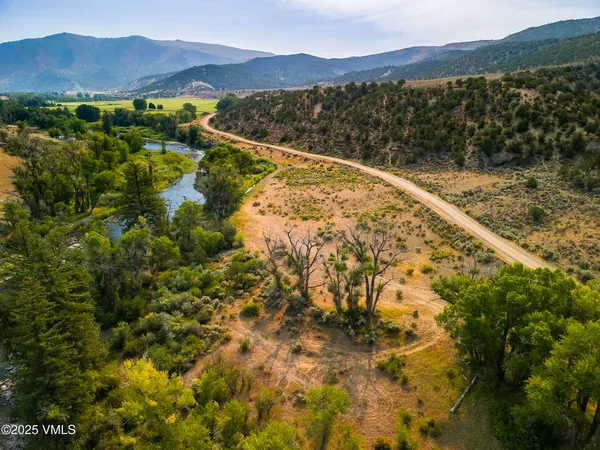 a view of a lake with mountains in the background