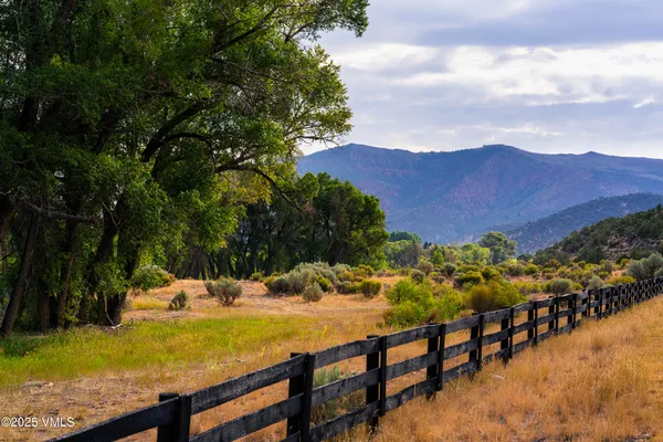 a view of a swimming pool with a mountain