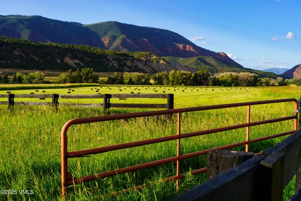 a view of swimming pool from a balcony
