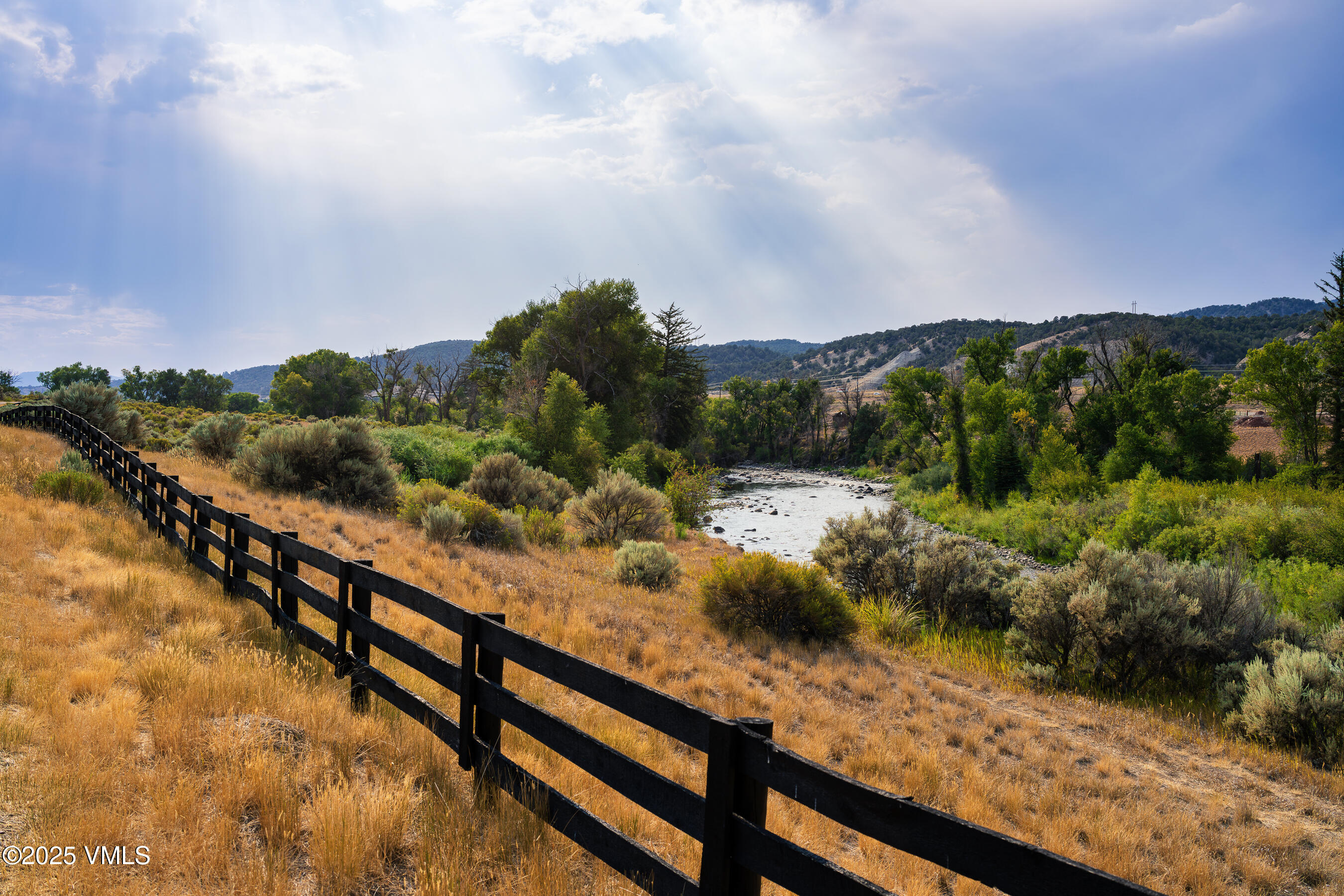 1633 West Diamond Star Road Eagle, CO 81631 - Photo 8 of 32 a view of a lake from a balcony