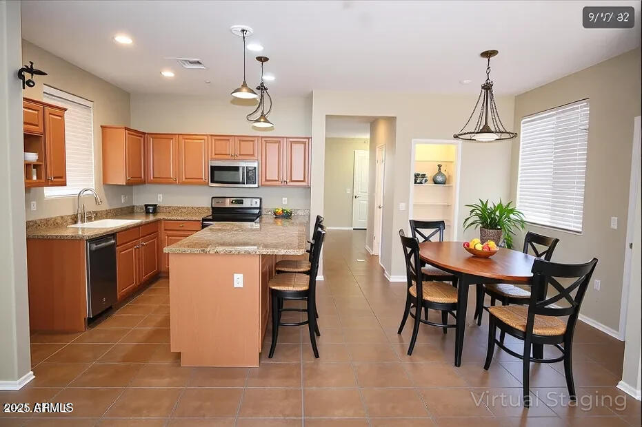 4114 South Sawmill Road Gilbert, AZ 85297 - Photo 12 of 42 Sawmill kitchen dining staged