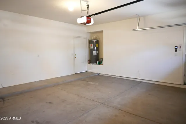 an aerial view of a residential houses with outdoor space
