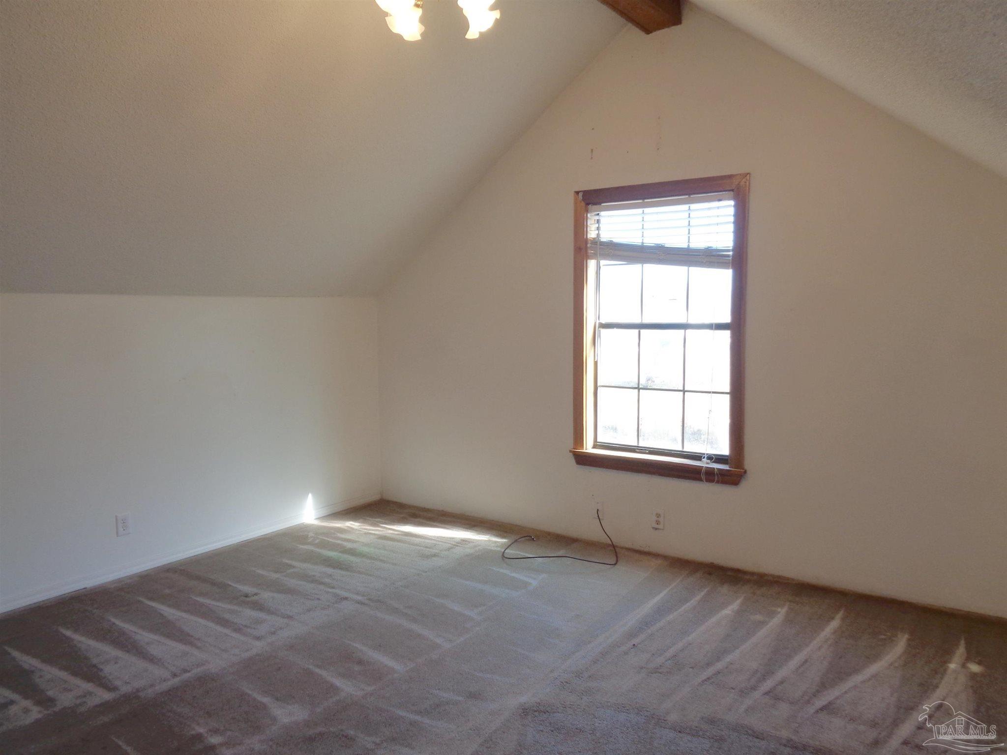 252 S Road Atmore, AL 36502 - Photo 18 of 40 an empty room with a window