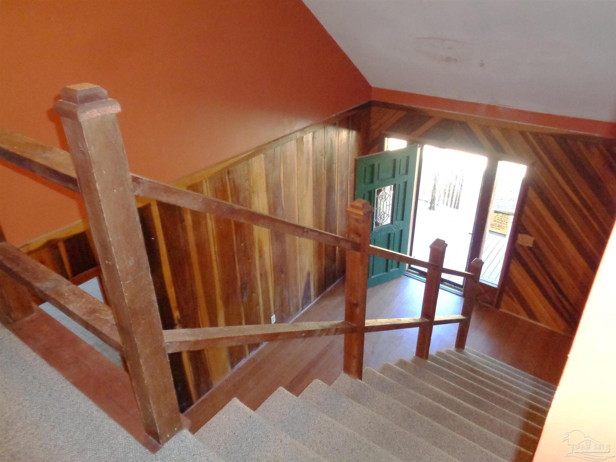 252 S Road Atmore, AL 36502 - Photo 20 of 40 a view of staircase with wooden floor and white walls
