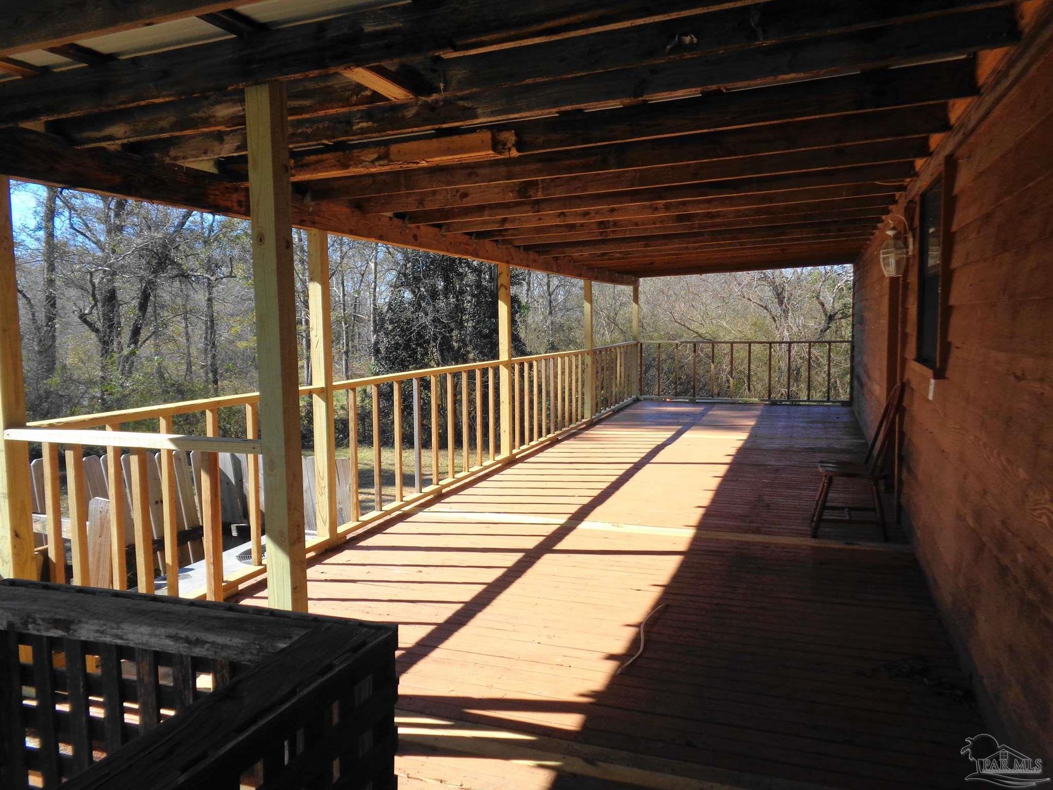 252 S Road Atmore, AL 36502 - Photo 29 of 40 a view of balcony with wooden floor