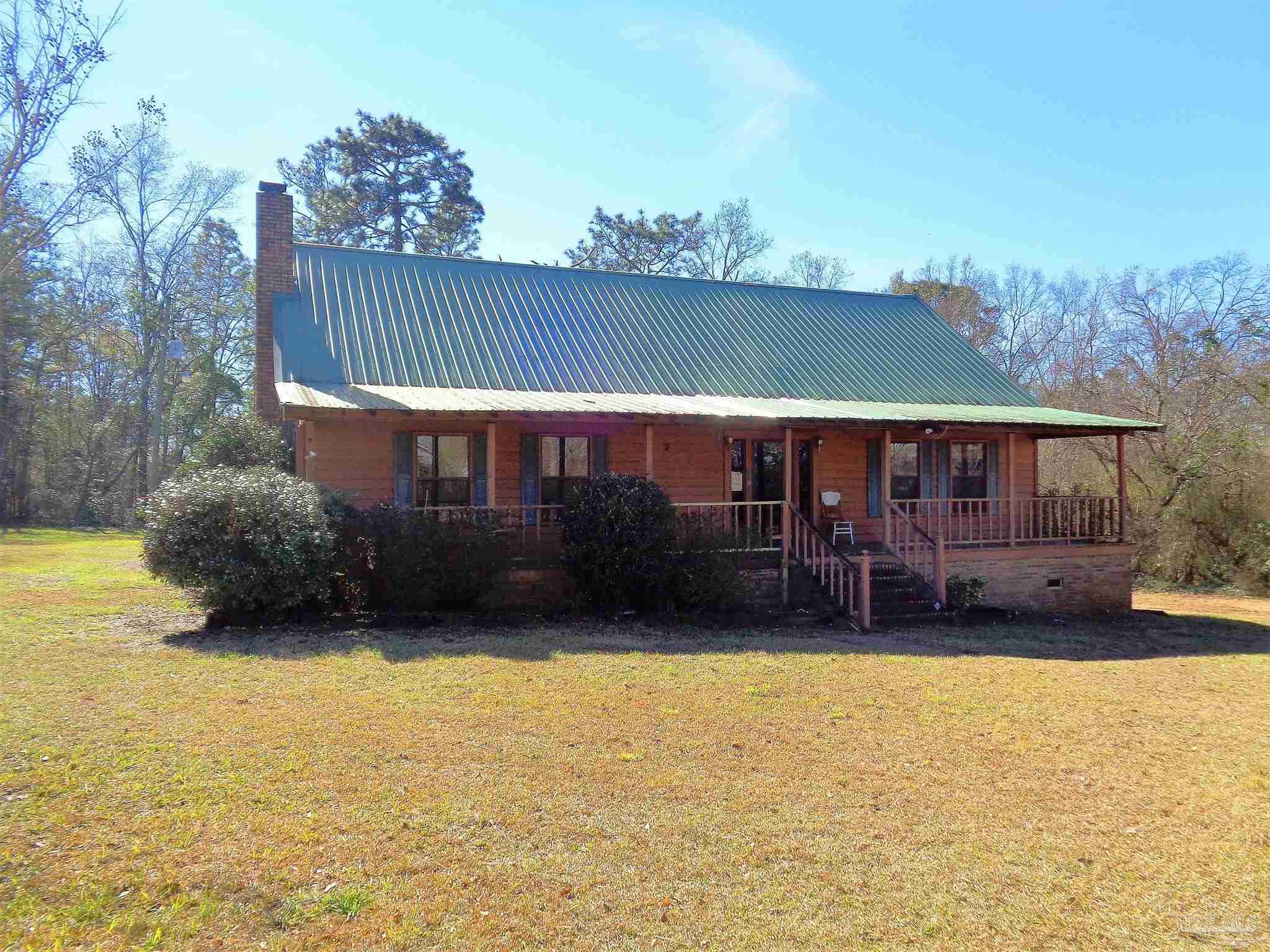 252 S Road Atmore, AL 36502 - Photo 37 of 40 a view of a house with a yard balcony and swimming pool