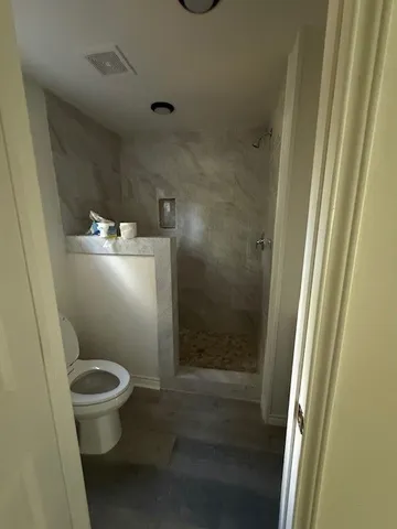 a utility room with a sink dryer and washer