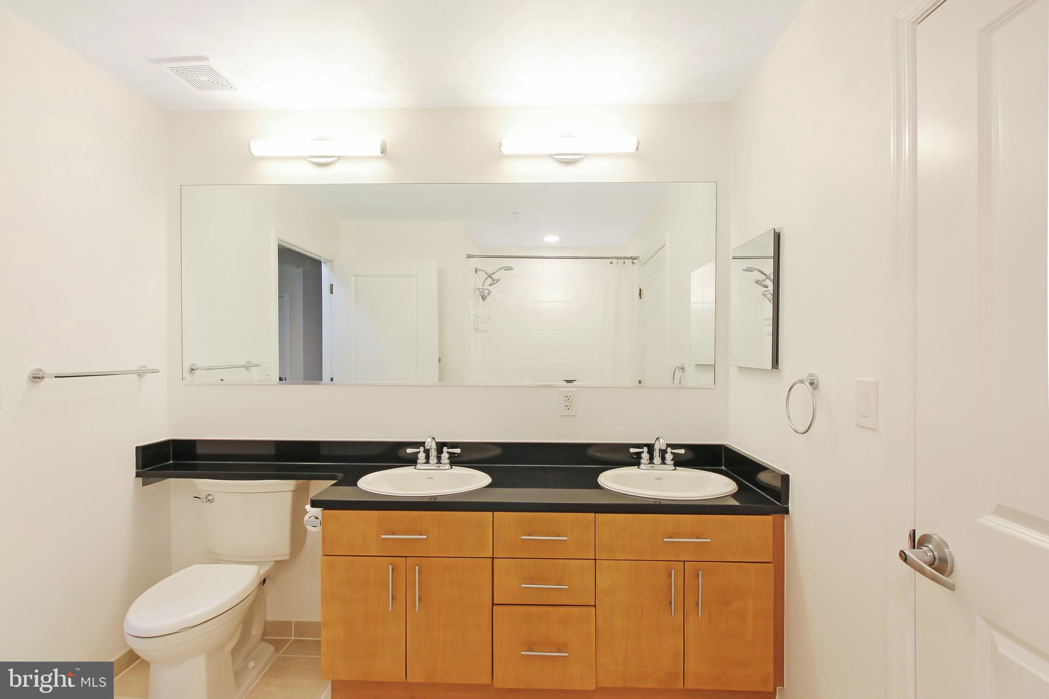715 6th Street Northwest, Unit 1002 Washington, DC 20001 - Photo 29 of 38 Shared Bathroom