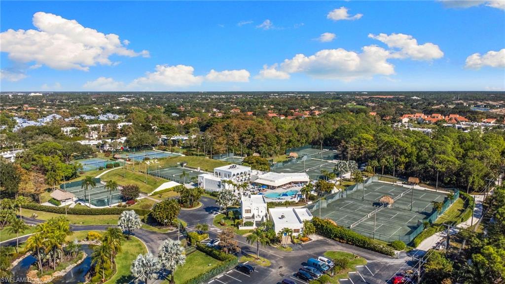 3324 Olympic Drive, Unit 313 Naples, FL 34105 - Photo 22 of 43 an aerial view of residential houses with outdoor space