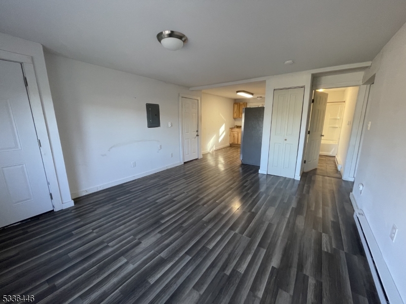 13 Highway 206 Branchville, NJ 07826 - Photo 12 of 29 a view of a room with wooden floor and staircase