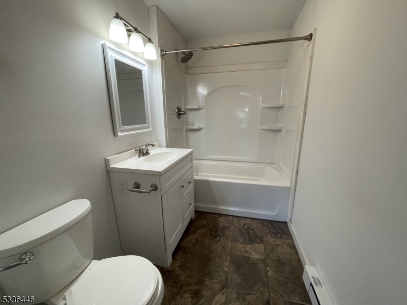 13 Highway 206 Branchville, NJ 07826 - Photo 18 of 29 a bathroom with a sink a toilet and shower