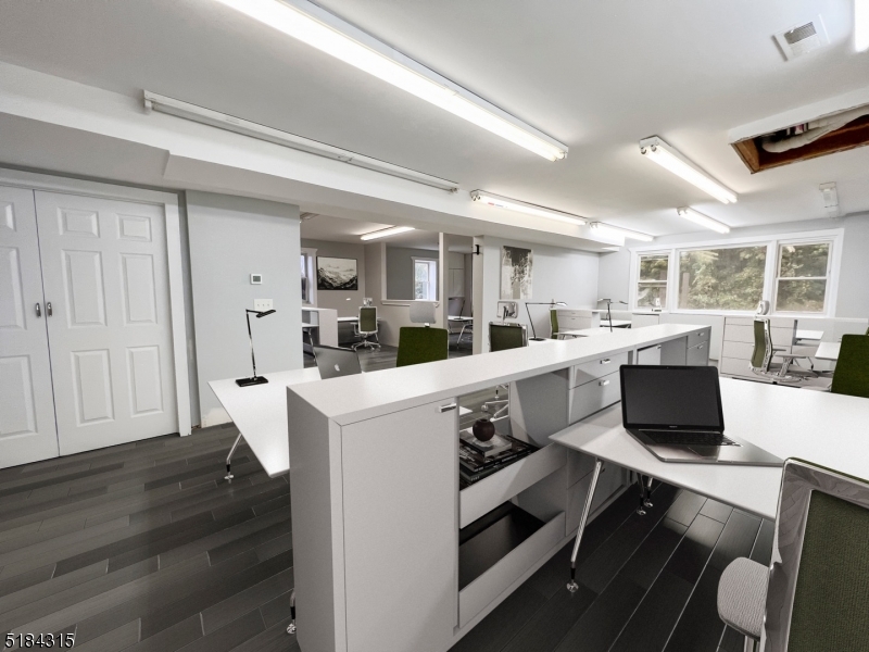 13 Highway 206 Branchville, NJ 07826 - Photo 23 of 29 a kitchen with a table chairs refrigerator and cabinets