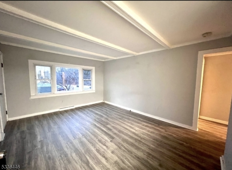13 Highway 206 Branchville, NJ 07826 - Photo 3 of 29 a view of an empty room with wooden floor and a window