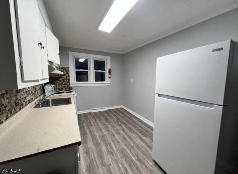 13 Highway 206 Branchville, NJ 07826 - Photo 4 of 29 a white refrigerator freezer sitting inside of a kitchen