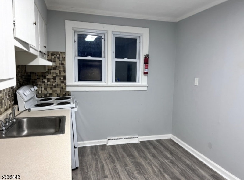 13 Highway 206 Branchville, NJ 07826 - Photo 5 of 29 a kitchen with a sink and a stove