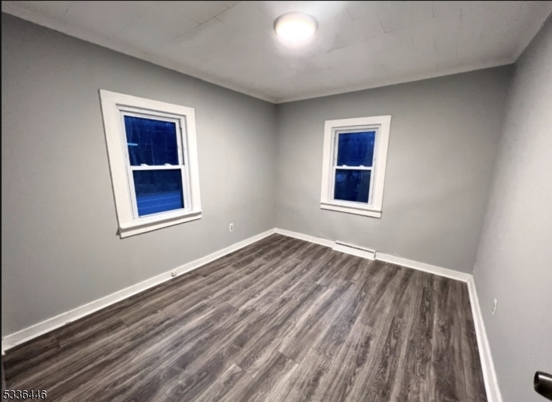 13 Highway 206 Branchville, NJ 07826 - Photo 9 of 29 a view of an empty room with wooden floor and a window