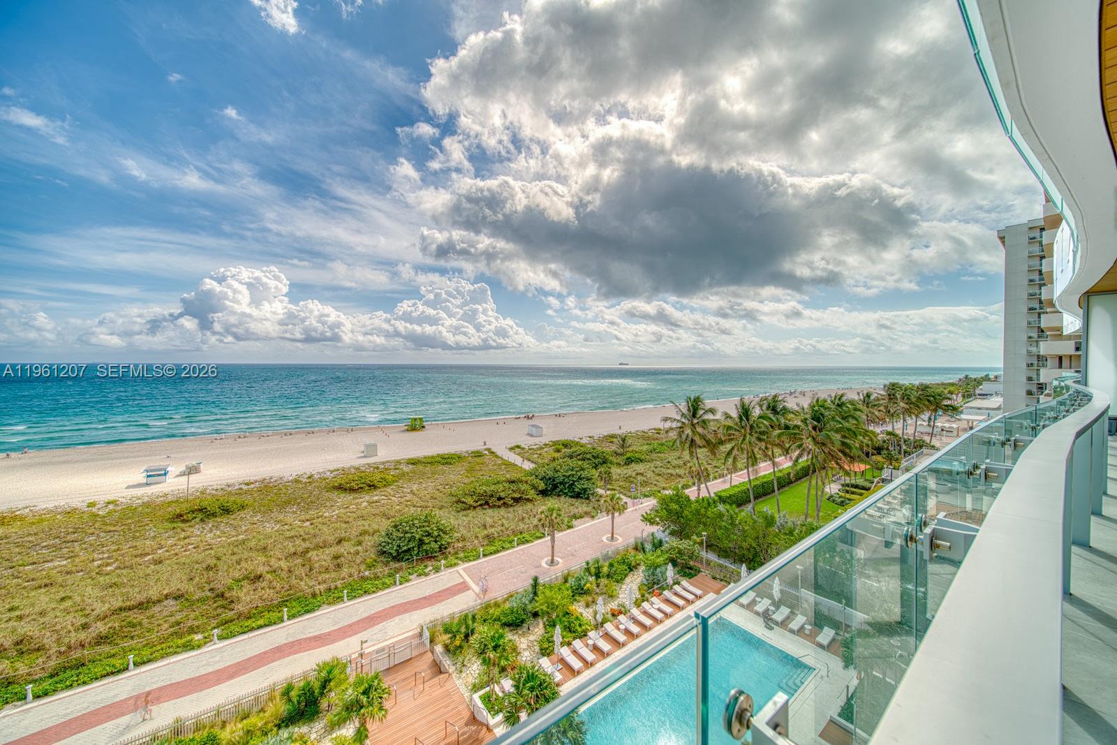 5775 Collins Avenue, Unit 703 Miami Beach, FL 33140 - Photo 44 of 44 a view of an ocean from a balcony