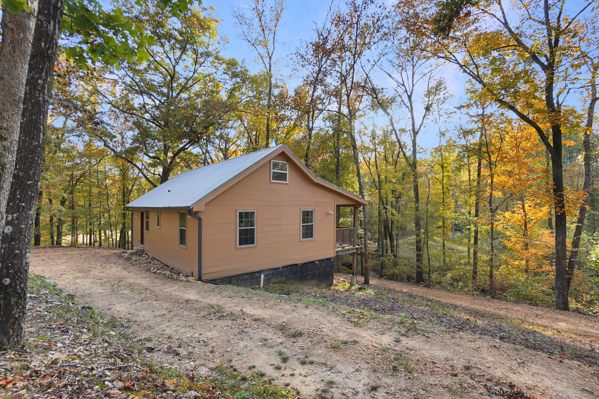 188 Woods Road Dover, TN 37058 - Photo 26 of 31 a view of a house with a yard and large tree