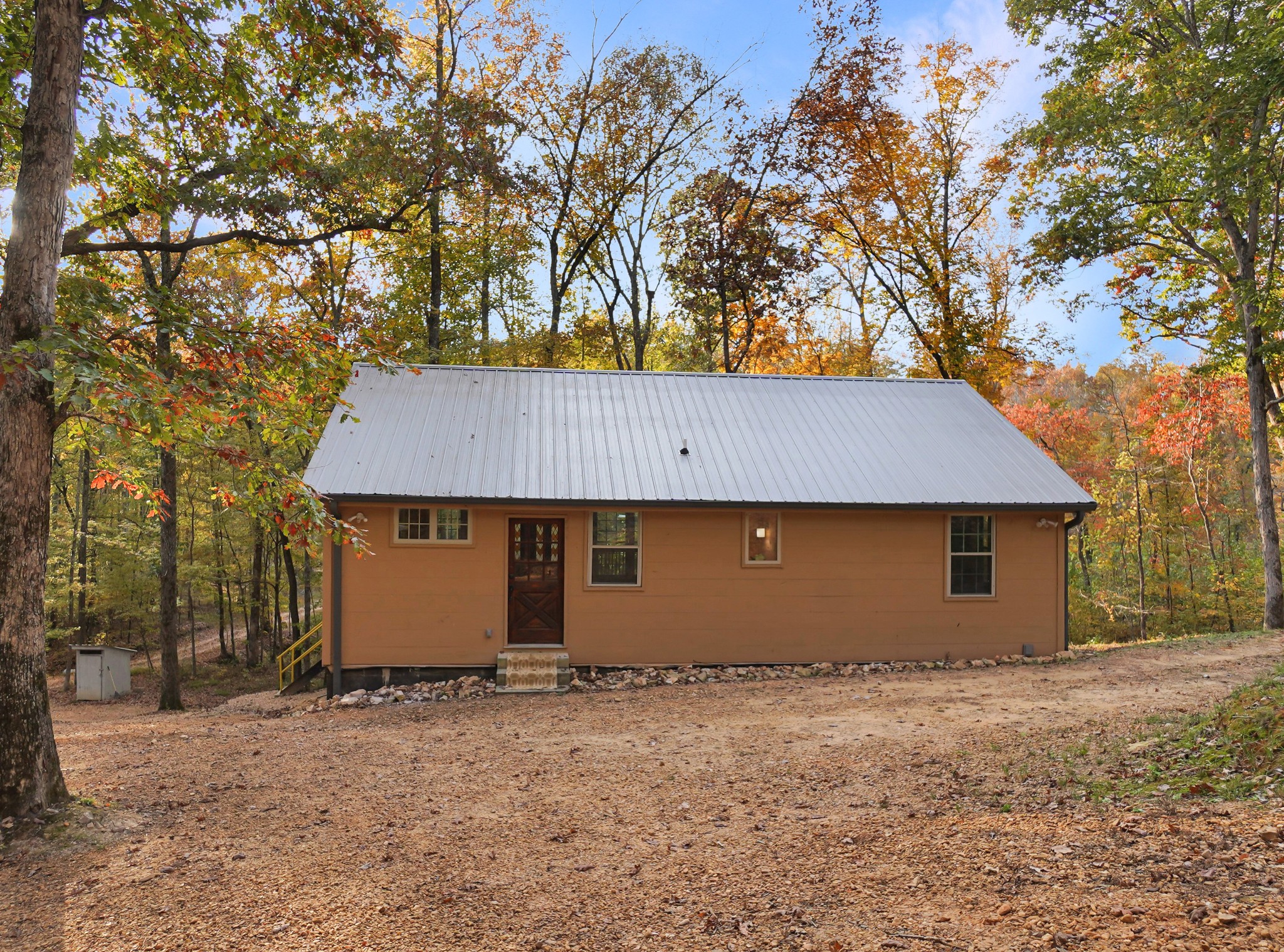188 Woods Road Dover, TN 37058 - Photo 27 of 31 a view of a house with a backyard