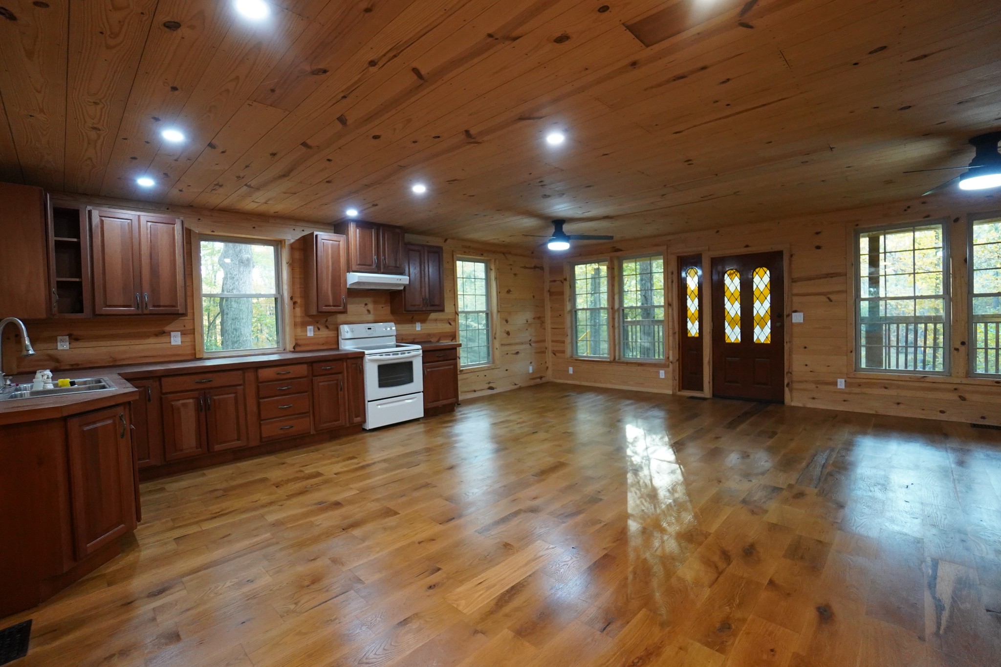 188 Woods Road Dover, TN 37058 - Photo 5 of 31 a view of kitchen with granite countertop stainless steel appliances stove sink and cabinets