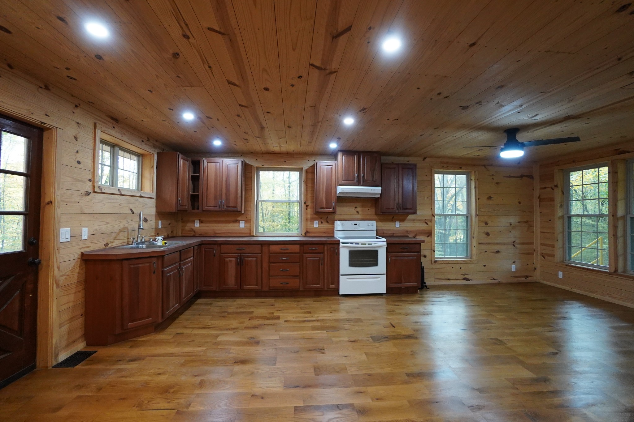 188 Woods Road Dover, TN 37058 - Photo 6 of 31 a large kitchen with stainless steel appliances and large windows