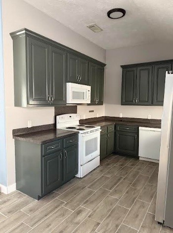 5637 Lotus Street Houston, TX 77085 - Photo 4 of 14 a kitchen with a sink cabinets and window