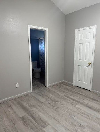 5637 Lotus Street Houston, TX 77085 - Photo 8 of 14 wooden floor and closet in a room