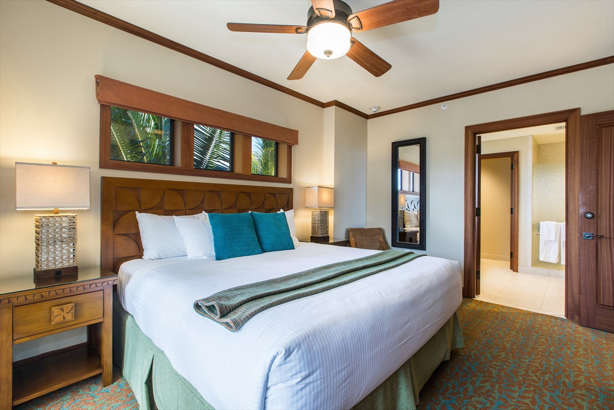 2641 Poipu Road, Unit 1401 Koloa, HI 96756 - Photo 3 of 12 a bedroom with a bed and a window