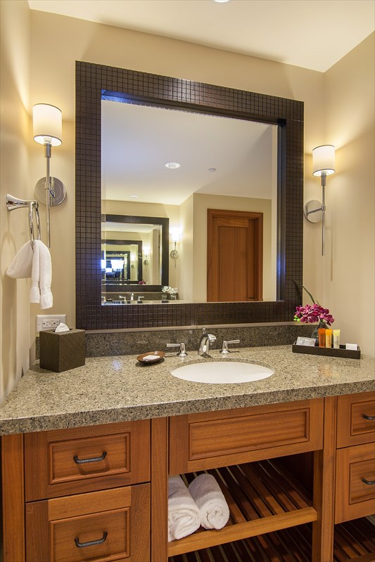 2641 Poipu Road, Unit 1401 Koloa, HI 96756 - Photo 7 of 12 a bathroom with a granite countertop sink and a mirror