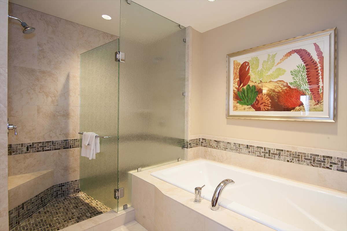 2641 Poipu Road, Unit 1401 Koloa, HI 96756 - Photo 8 of 12 a bathroom with a tub a sink and a shower