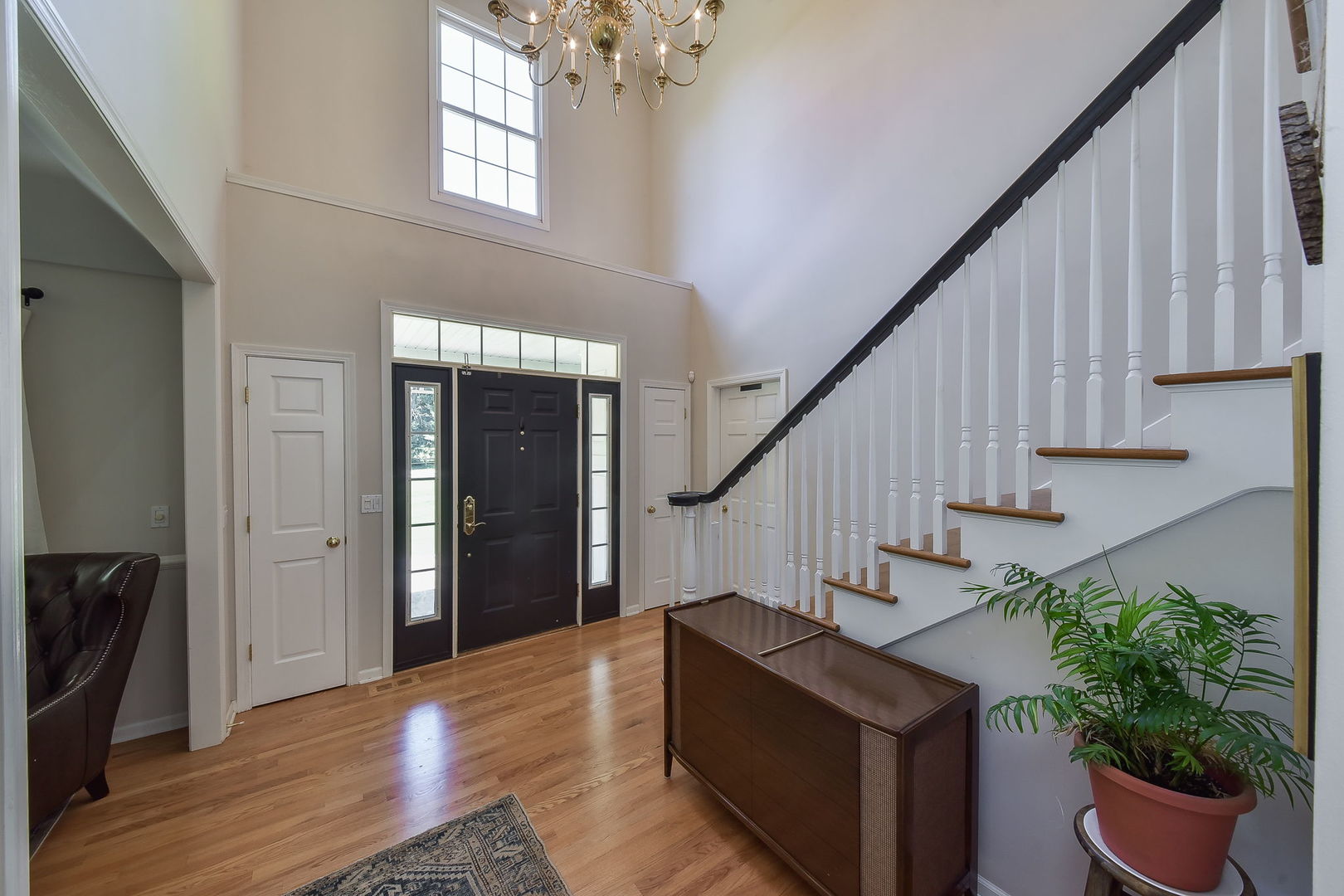 32W595 Oak Lawn Farm Road Wayne, IL 60184 - Photo 4 of 47 a view of entryway and hall with wooden floor