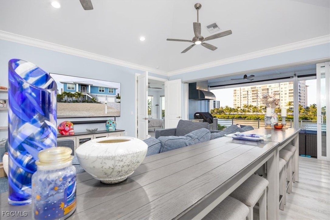 8425 Lagoon Road Fort Myers Beach, FL 33931 - Photo 14 of 49 a room with furniture and a window