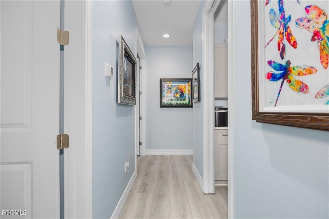 8425 Lagoon Road Fort Myers Beach, FL 33931 - Photo 30 of 49 a view of a hallway with interior of the house