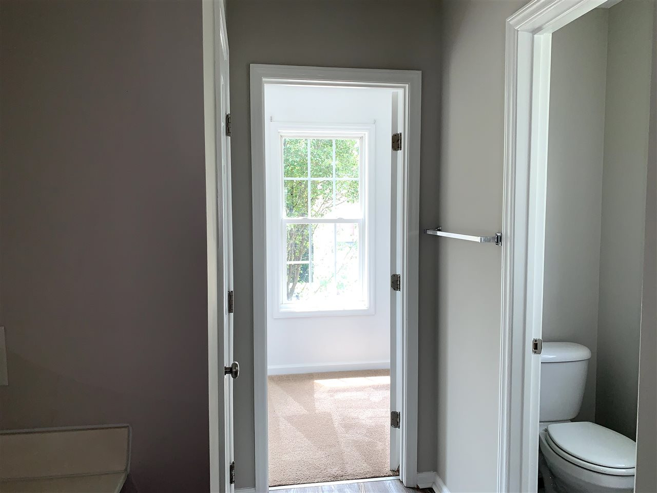 1929 Red Quartz Drive Raleigh, NC 27610 - Photo 12 of 12 large walk in closet with window. Separate toilet room for privacy. linen closet on other side. walk in closet