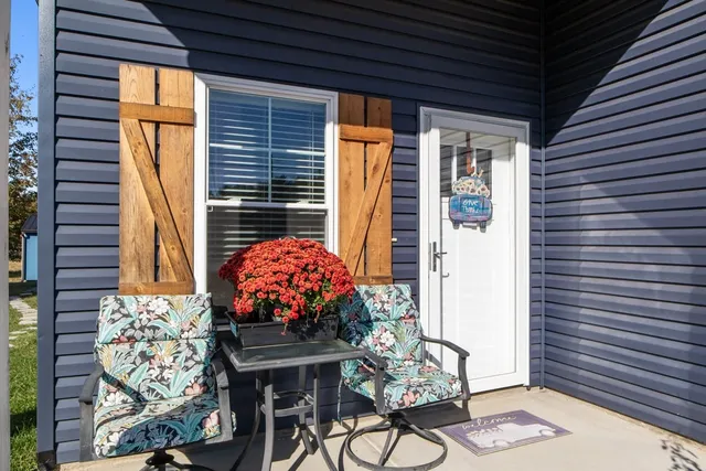 a front view of a house with patio