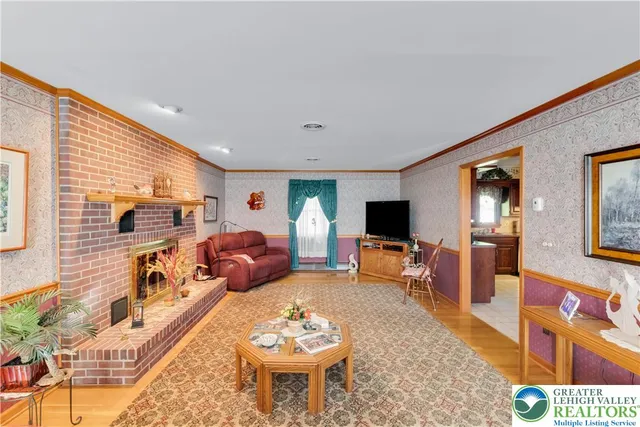 a living room with furniture or couch and a dining table