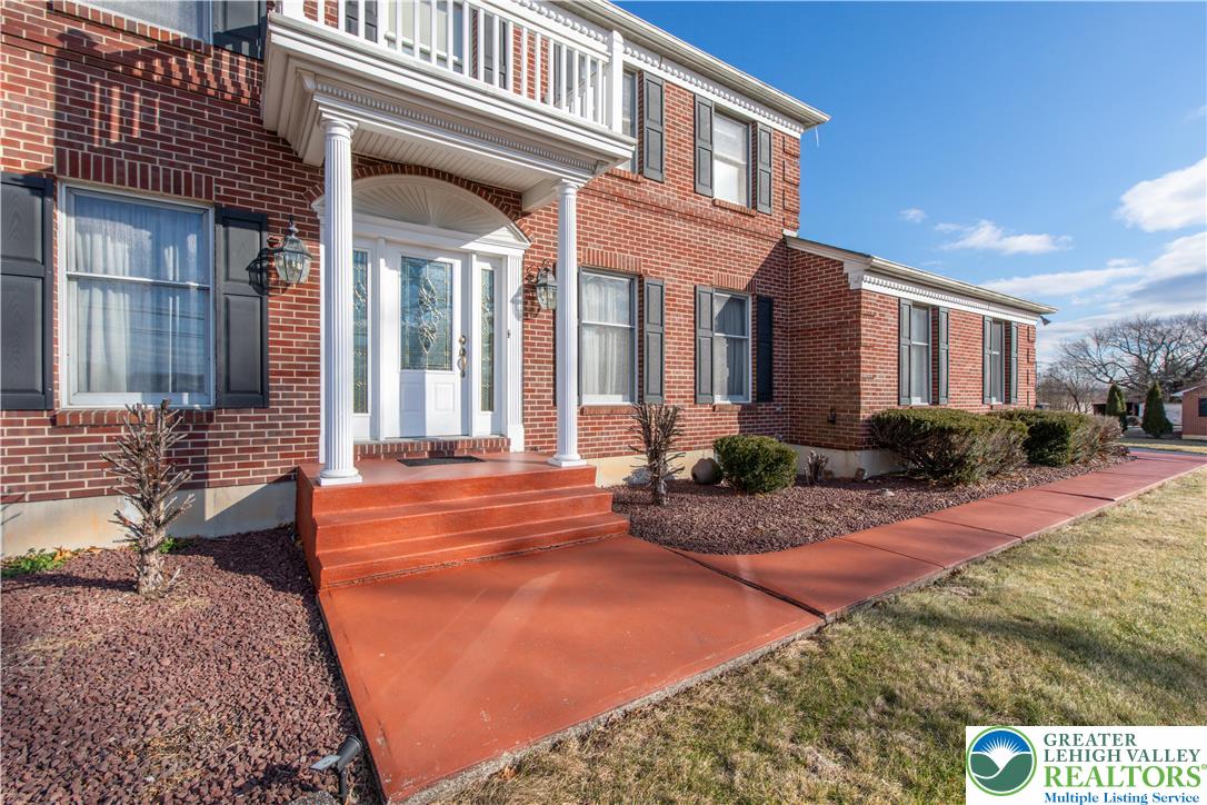 656 Daniels Road Nazareth, PA 18064 - Photo 2 of 54 a view of a house with backyard and sitting area