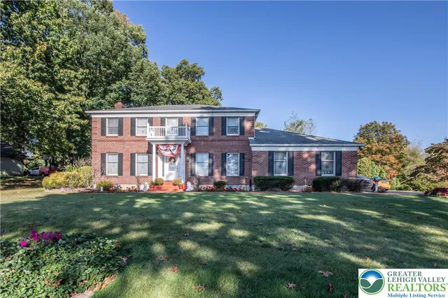 a view of a house with a big yard