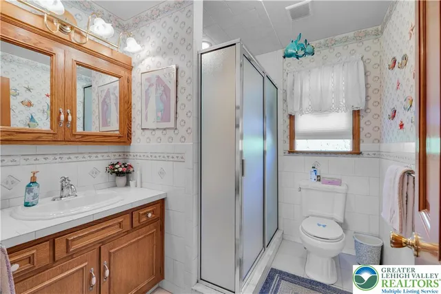 a bedroom with a bed and a walk in closet