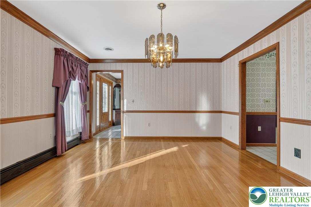 656 Daniels Road Nazareth, PA 18064 - Photo 6 of 54 a view of a livingroom with wooden floor