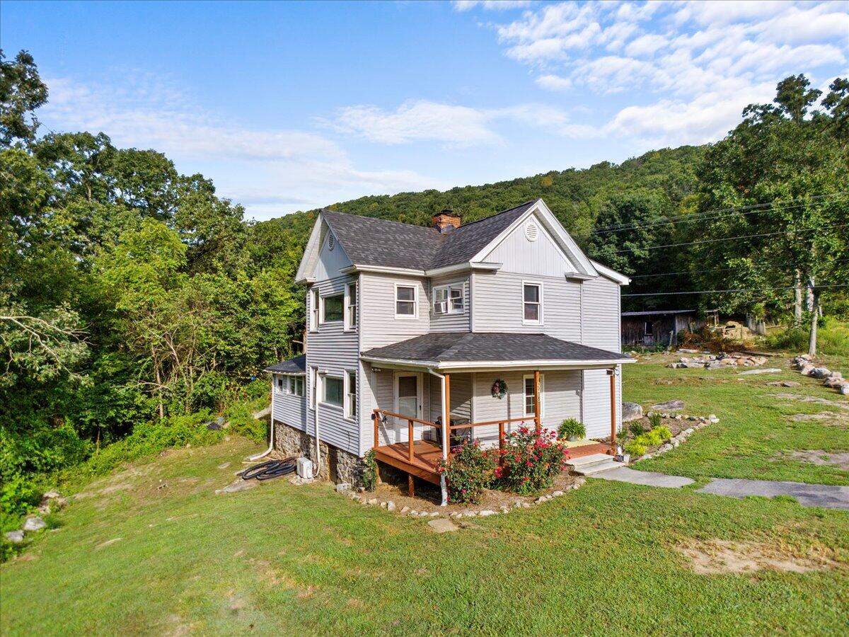 2938 North Fork Road Elliston, VA 24087 - Photo 3 of 41 a view of a house with a yard balcony and sitting area