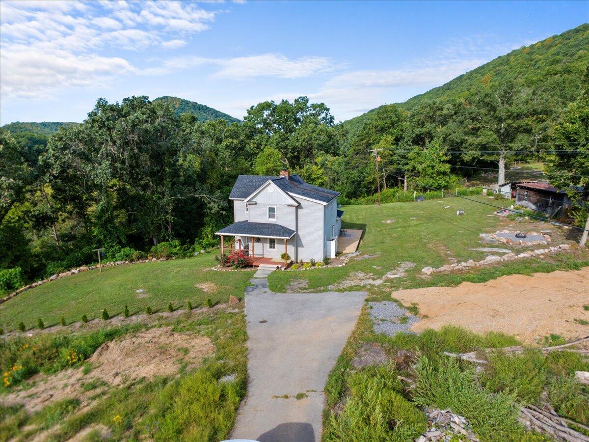 2938 North Fork Road Elliston, VA 24087 - Photo 37 of 41 a front view of a house with garden