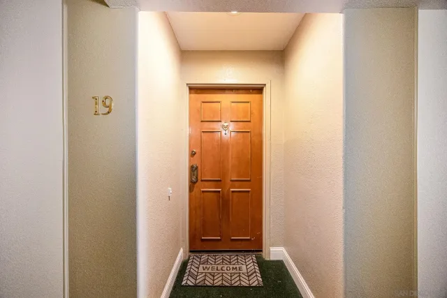 an aerial view of building with yard