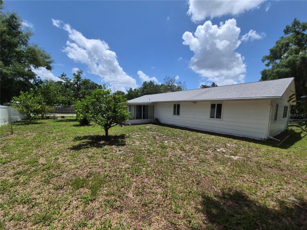 25632 Southwest 19 Avenue Newberry, FL 32669 - Photo 19 of 20 a view of a house with a yard