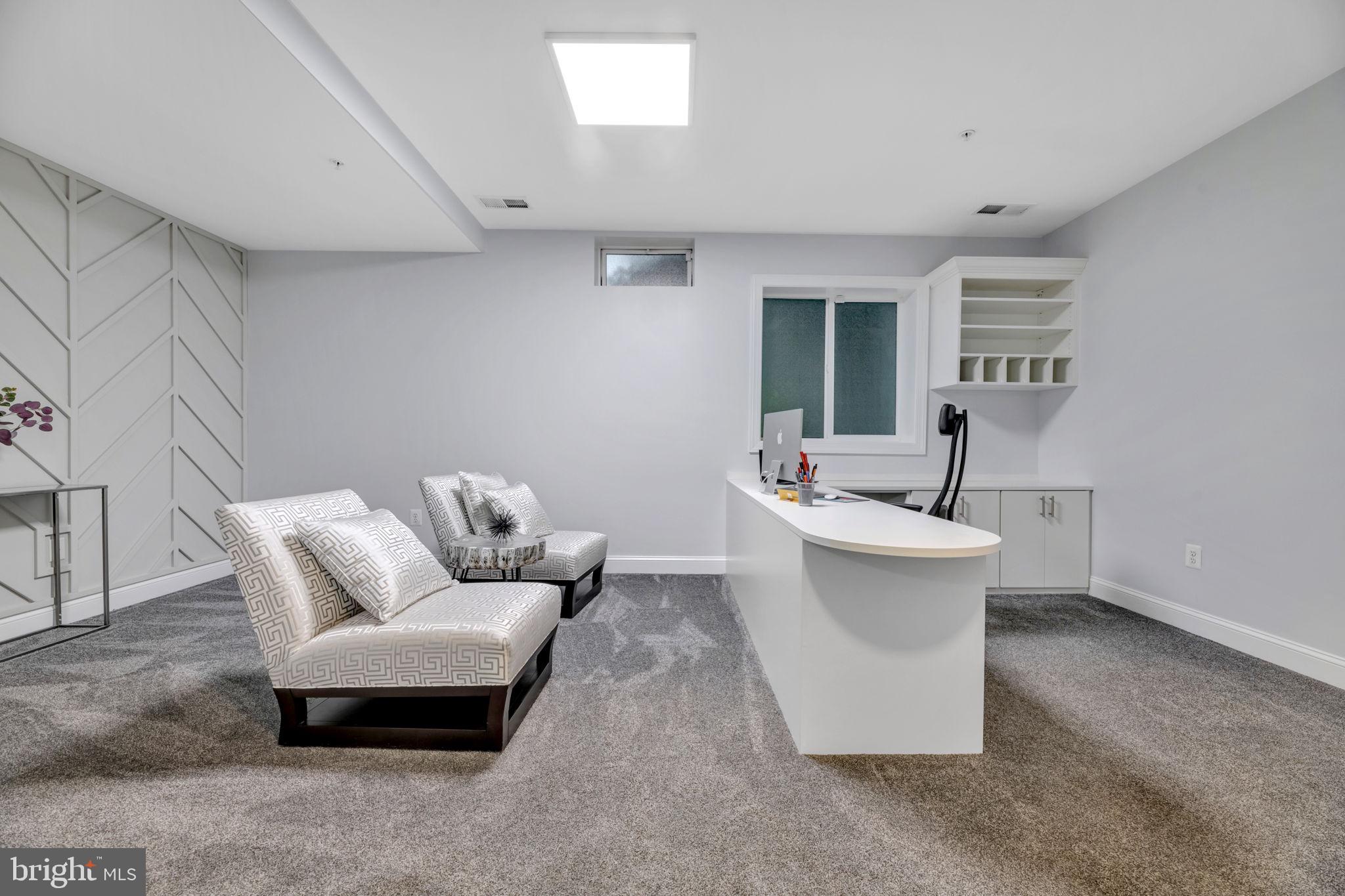 7619 Elmcrest Road Hanover, MD 21076 - Photo 25 of 35 a living room with furniture and a window