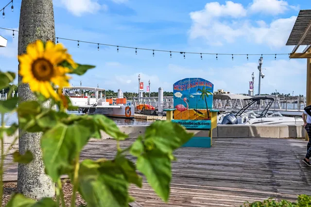 a view of a hallway with seating area and furniture