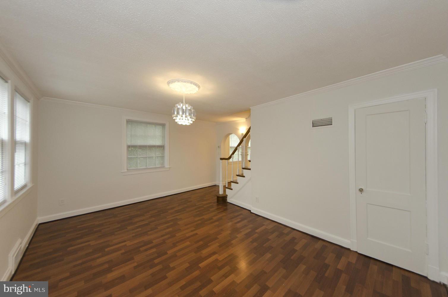 2016 North Troy Street Arlington, VA 22201 - Photo 2 of 25 an empty room with wooden floor and windows