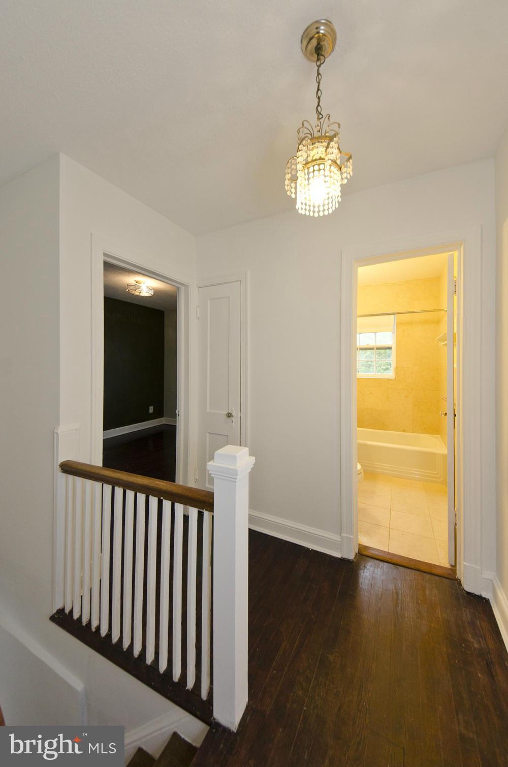 2016 North Troy Street Arlington, VA 22201 - Photo 11 of 25 a view of a room with wooden floor fan and window
